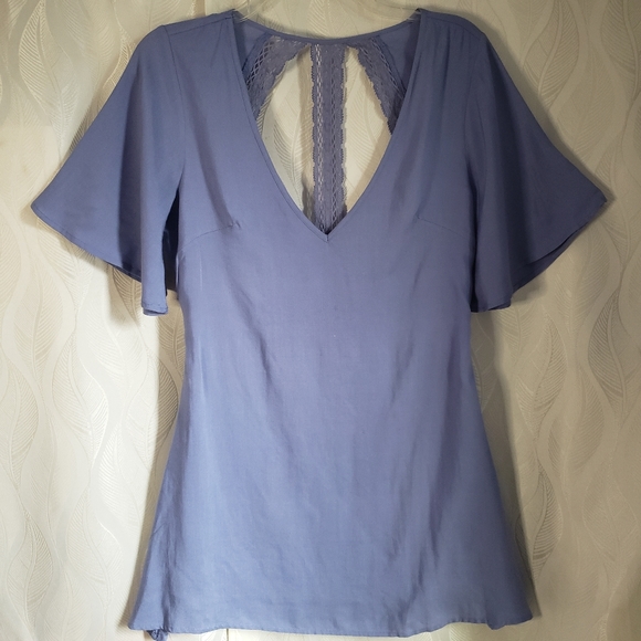 Tobi Pastel Purple Vneck Open Back Crochet Lace Flutter Sleeve Mini Sundress - Picture 1 of 6